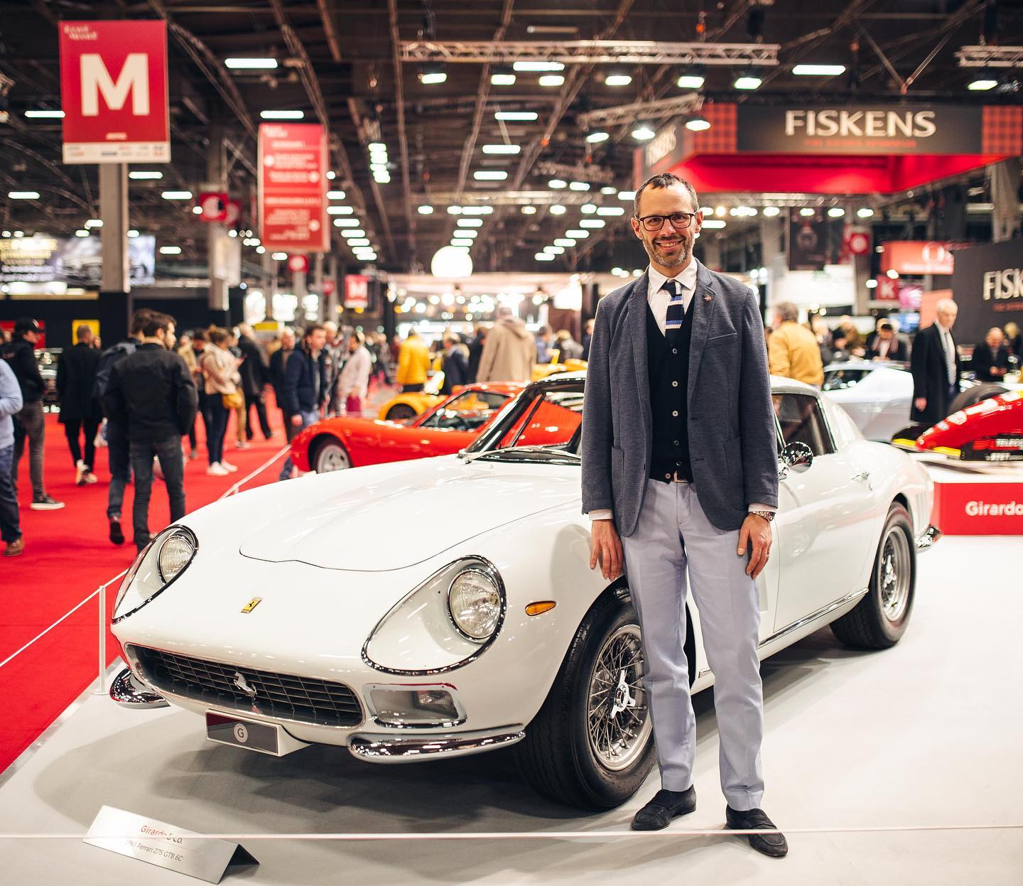 Max Girado with a Ferrari 275 at Retromobile