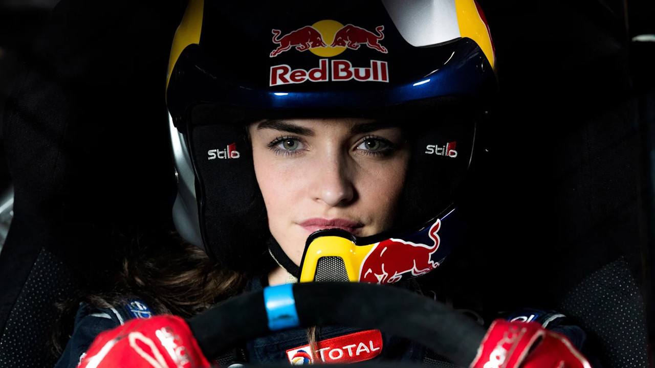 Catie Munnings in racing helmet.
