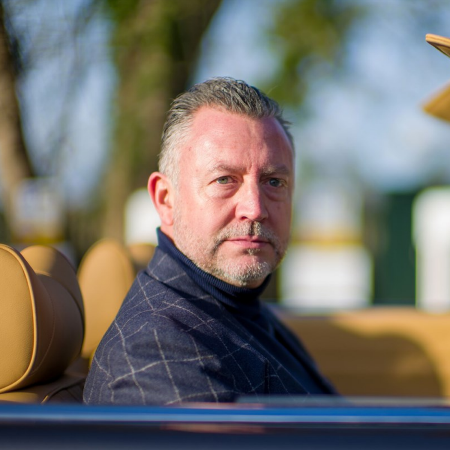 Justin Lunny sat in a Mercedes SL Pagoda